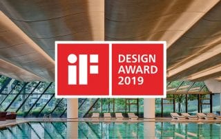 iF World Design Guide Design Award 2019 logo with indoor swimming pool and white lounge chairs